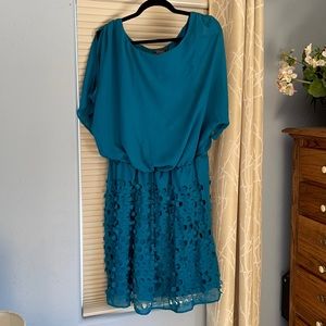 Teal blue dress with cold shoulder feature